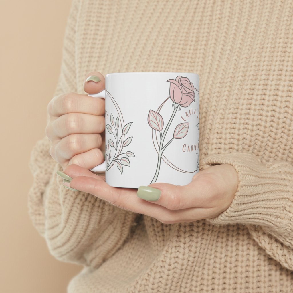 Hands holding Laila's Garden mug